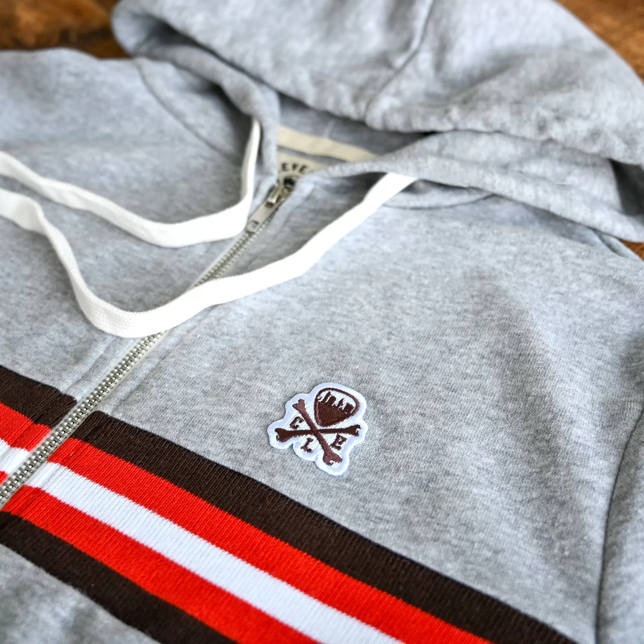 Limited Edition: CLE logo Patch Unisex Full Zip Hoodie - Brown/Orange Stripe