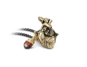 Small Anatomical Heart Necklace with Garnet - Bronze